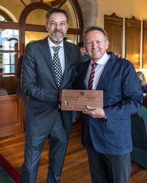 Senior category winner receiving The Hickory Masters wooden trophy during the prizegiving ceremony.