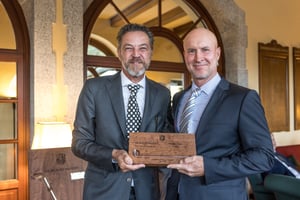 Open category gross winner receiving The Hickory Masters handcrafted wooden trophy.
