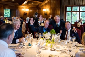 Participants gathered around the dinner table during The Hickory Masters gala evening.