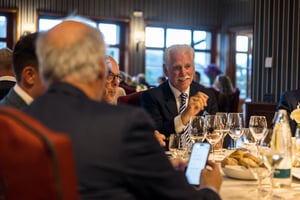 Guests enjoying dinner during The Hickory Masters gala at the golf club clubhouse.