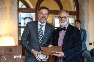 Senior category winner receiving The Hickory Masters wooden trophy during the prizegiving ceremony.